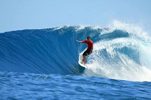 surfer riding a large wave
