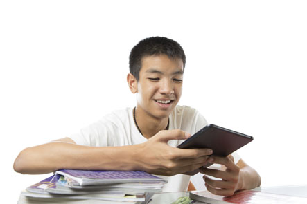 Asian teenage boy with ipad